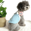 Poodle wearing Pretty Summer Adjustable Dog Dress with a pink and white striped T-shirt pretty fluffy flower on adjustable strap and green leaf sown on pocket and Lead attachment, from Puppy Clothes